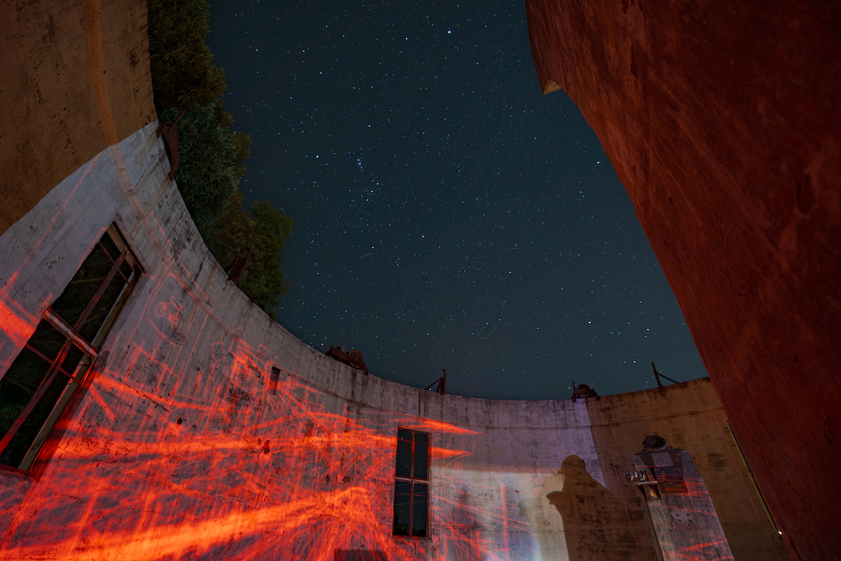 Mount Stromlo during Enlighten Festival. Photo: Nic Vevers/ANU Light projections at night